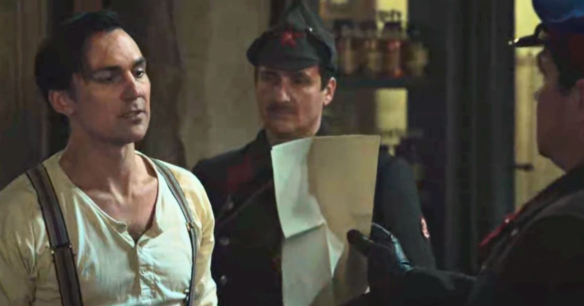 Genec Kurc (Henry Lloyd-Hughes) gets questioned by Soviet forces in 'We Were the Lucky Ones' Episode 3 (@Hulu)