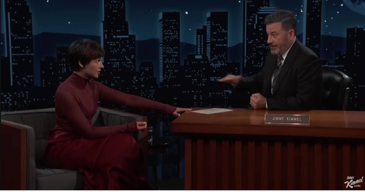 Screenshot of Naomi Scott in a conversation with Jimmy Kimmel. (Cover Image Source: YouTube | Photo By @JimmyKimmelLive)