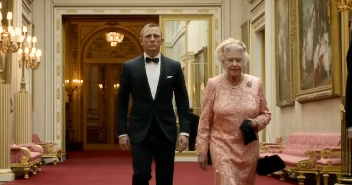 Daniel Craig and Queen Elizabeth II in a still from a promotional video for the 2012 Olympic Games. (Cover Image Source: YouTube |Olympics )