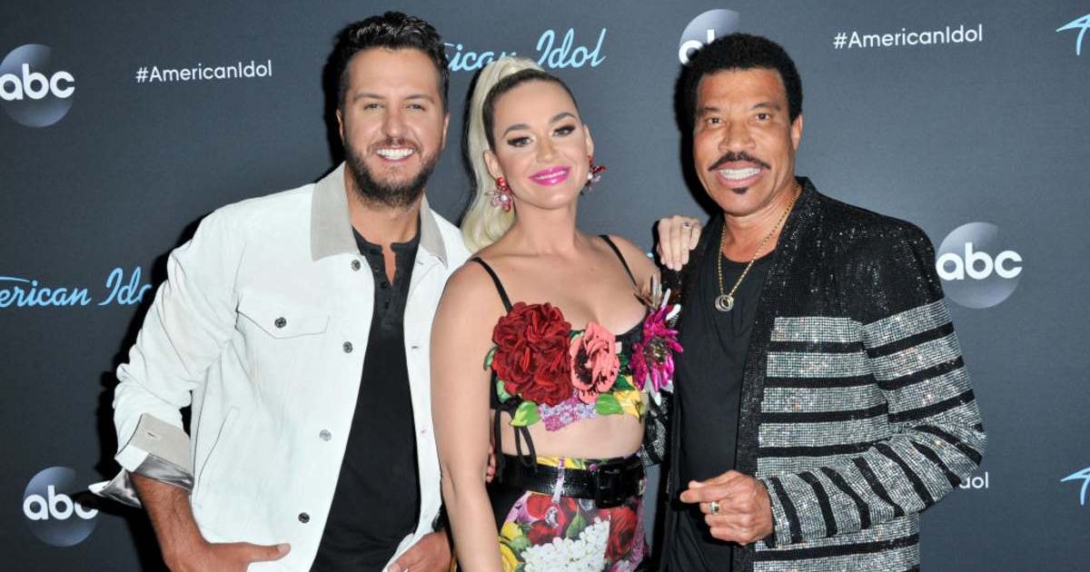 (L-R) Luke Bryan, Katy Perry, and Lionel Richie pose for a photo after ABC's 'American Idol' in LA, California (Image Source: Getty Images | Photo by Allen Berezovsky)