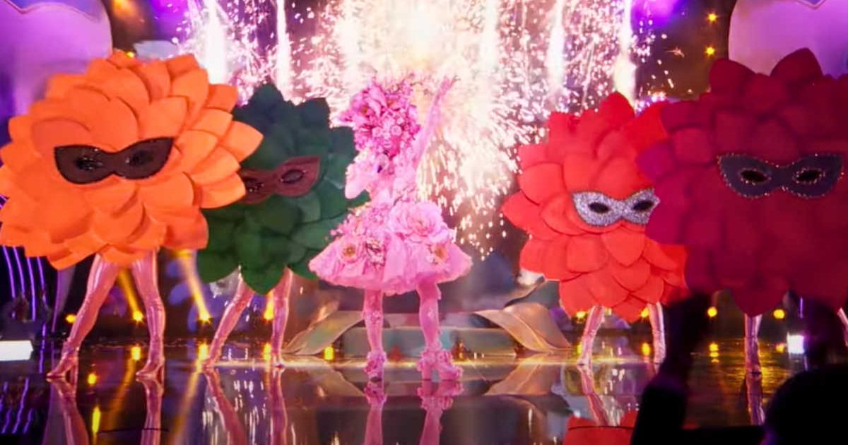 Screenshot of contestant Cherry Blossom performing on stage from 'The Masked Singer' episode (Cover Image Source: YouTube | The Masked Singer)
