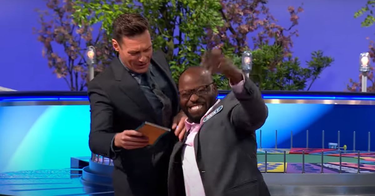 Screenshot of Ryan Seacrest and Ricky Brown on 'Wheel of Fortune'  (Cover Image Source: YouTube | Wheel of Fortune)