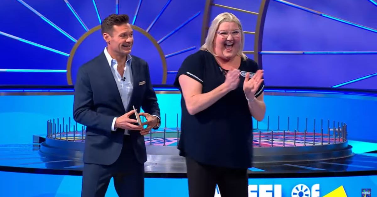 A screenshot of Ryan Seacrest and Catrice Sandt from an episode of 'Wheel of Fortune' (Image Source: YouTube | Wheel of Fortune)