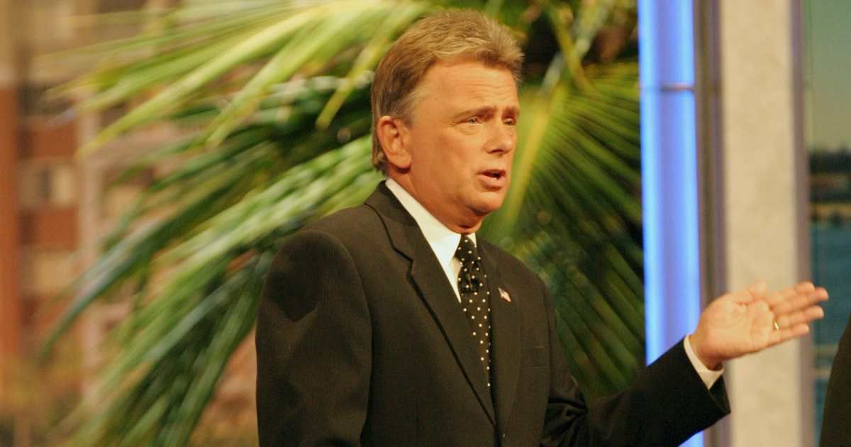 'Wheel of Fortune' host Pat Sajak looks towards the contestants during the show.  (Cover Image Source: Getty Images | Photo by Ralph Notaro)