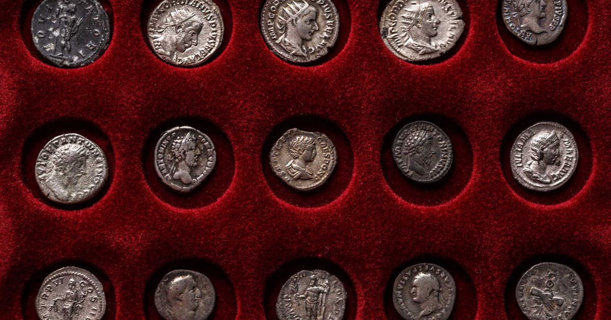 Numismatics authentic silver denarius, antoninianus of ancient Rome. A collector holds an old coin. Ancient coin of the Roman Empire. (Representative Cover Image Source: Getty Images | Photo by IURII BUKHTA)