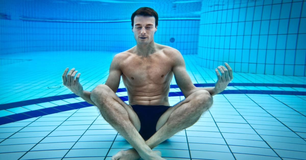 Man meditating in a swimming pool. (Representative Cover Image Source: Getty Images | Photo by Stefano Oppo)