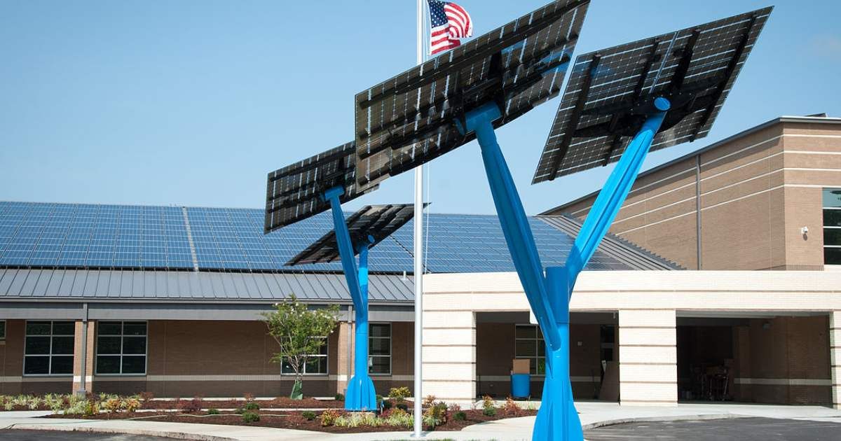 Spotlight Solar product 'Lift' at net-zero school in NC, Sandy Grove Middle School – green building, solar sculpture, solar art, architecture. (Representative Cover Image Source: Wikimedia Commons | Photo by Spotlight Solar)