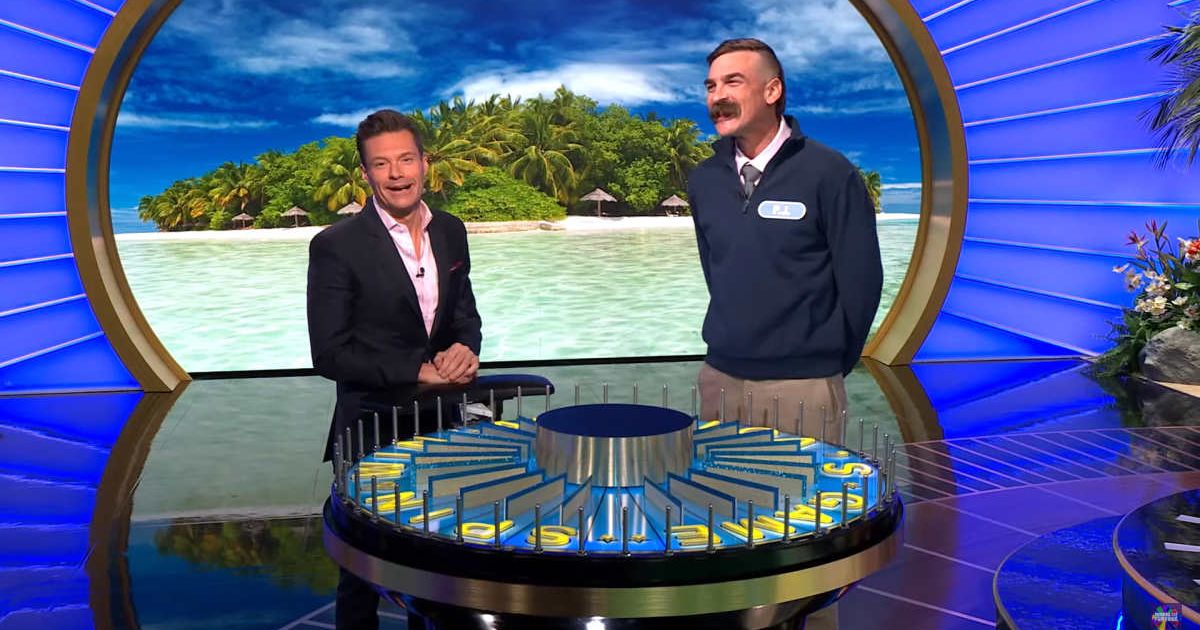 A screenshot of Ryan Seacrest and PJ Wilder from an episode of 'Wheel of Fortune' (Image Source: YouTube | Wheel of Fortune)