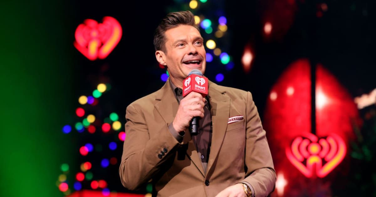 Ryan Seacrest speaks onstage during iHeartRadio 102.7 KIIS FM's Jingle Ball 2024 Presented by Capital One at Intuit Dome. (Cover Image Source: Getty Images | Photo by Kevin Mazur)