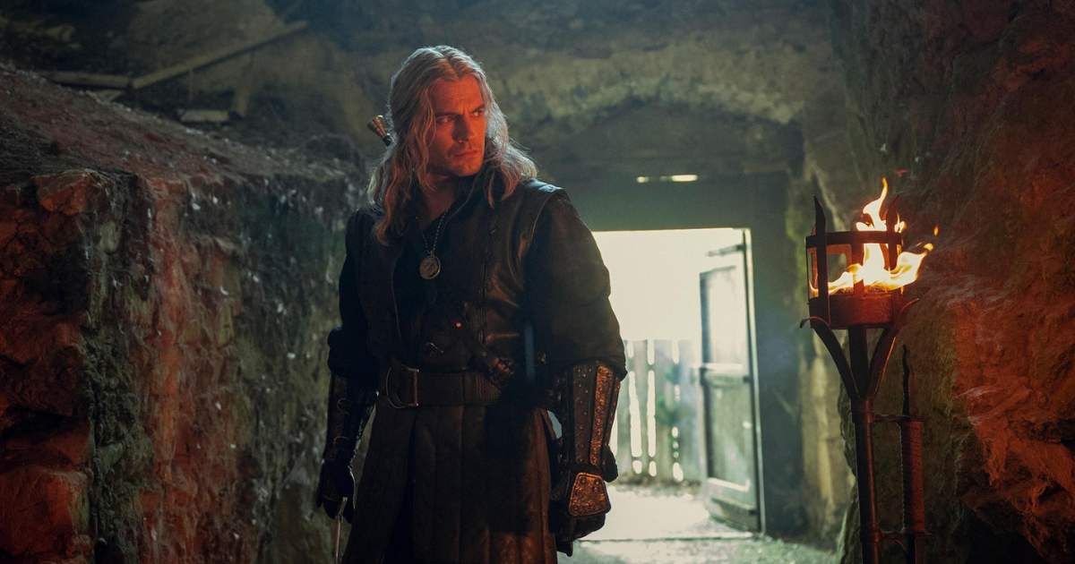Henry Cavill in a still from 'The Witcher' (Cover image credit: Netflix | Photo by Susie Allnutt)