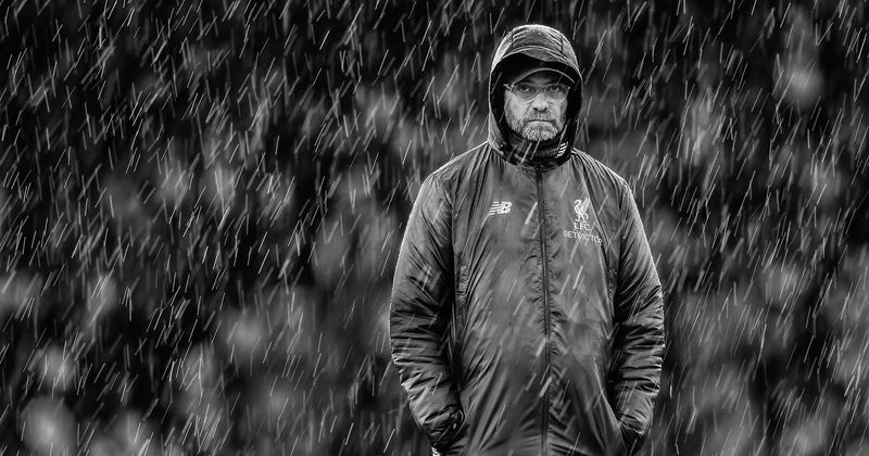 Liverpool manager Jurgen Klopp watches the rain (Getty Images)