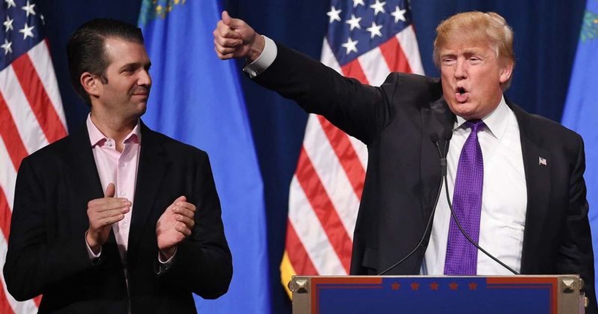 Donald Trump Jr looks on as his father, former President Donald Trump waves on February 23, 2016, in Las Vegas, Nevada (Getty Images)