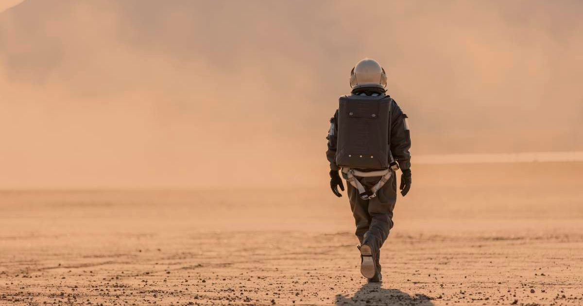 Astronaut walking on Mars-like surface. (Representative Cover Image Source: Getty Images | Photo by 	Nisian Hughes)