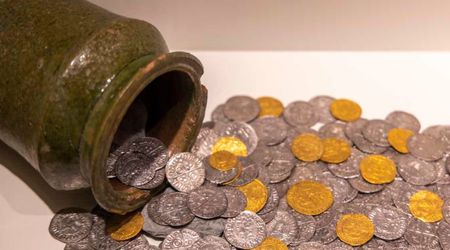 Amateur archaeologist's chance discovery of 2nd-cenuty gold coin in Czech Republic helped reveal unknown Celtic site