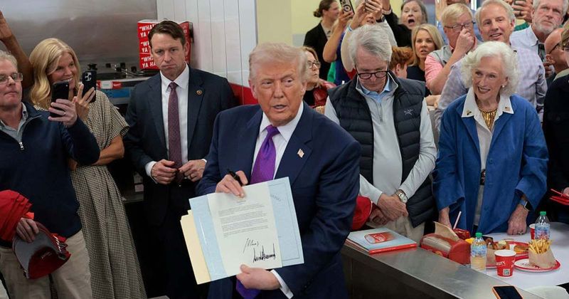 ‘Mine’s not an autopen’: Trump strikes out Biden’s signature, hand-signs Presidential Award