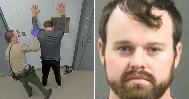 Booking video shows Joseph Duggar being patted down and searched against wall after arrest