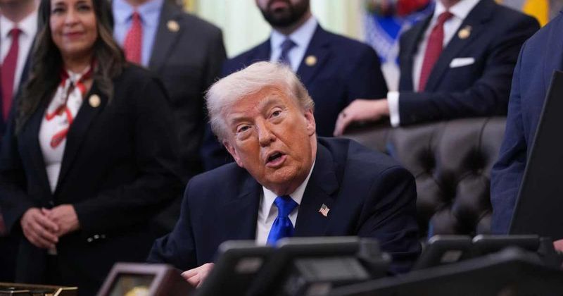 Tehran billboard shows Trump kneeling, offering Iran $100B over Hormuz