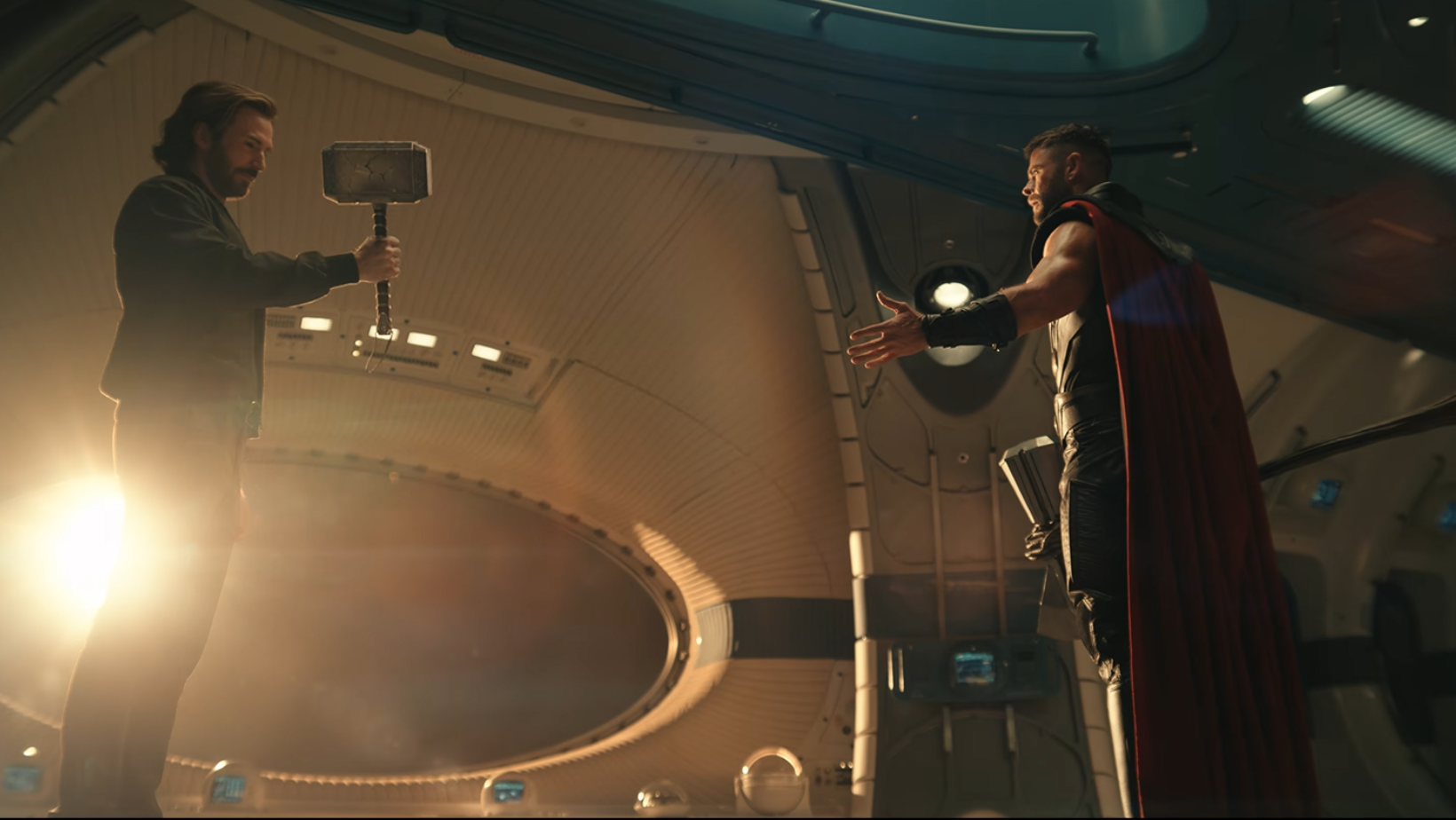 Steve Rogers holds Mjolnir as Thor reaches for the hammer in the ‘Avengers: Doomsday’ trailer (Image Source: YouTube | Marvel Entertainment)