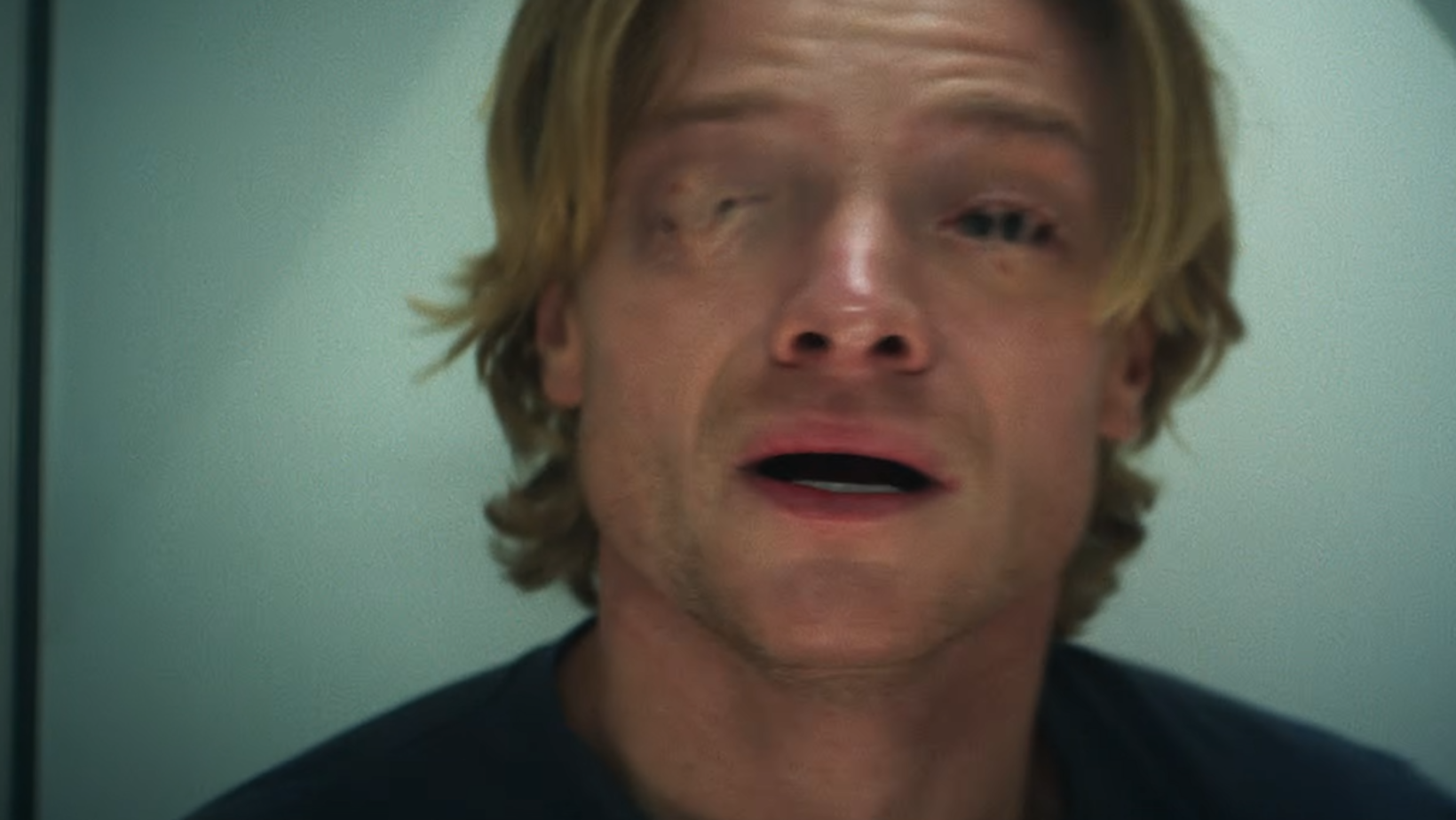 Image 1: Tom Rhys Harries as Matt Hagen struggles as his face begins to melt in 'Clayface' (Cover Image Source: Warner Bros. Pictures | YouTube)