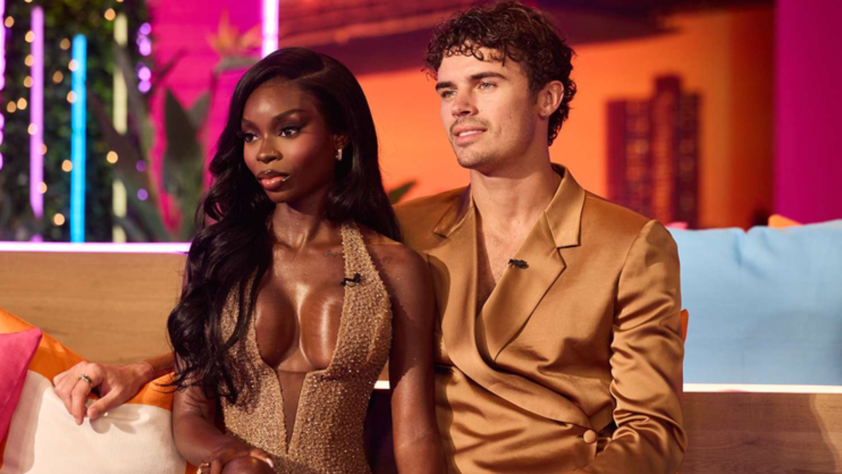 Olandria Carthen and Nic Vansteenberghe appear together during the 'Love Island USA' season 7 reunion (Image Source: Peacock)
