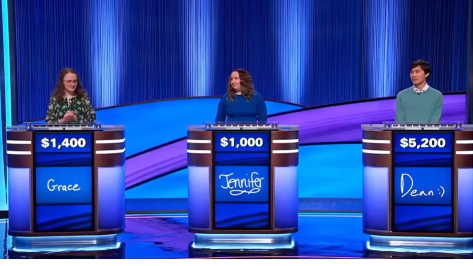 Grace, Jennifer and Dean playing 'Jeopardy!'