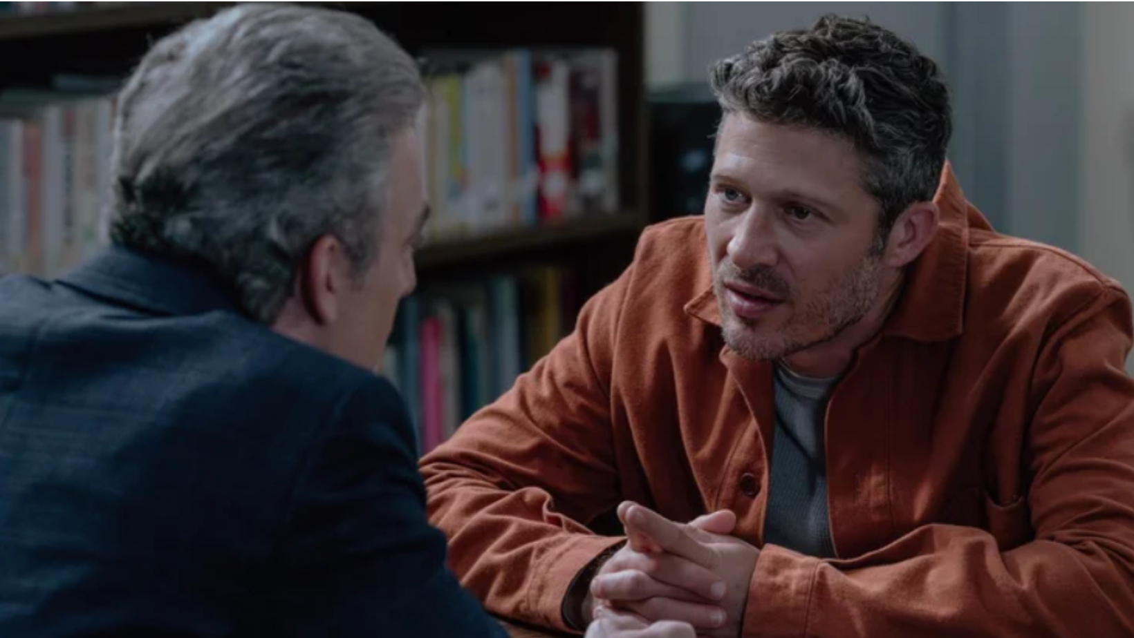 Joe Mantegna as David Rossi speaks with Zach Gilford as Elias Voit in 'Criminal Minds: Evolution' (Image Source: Paramount+)