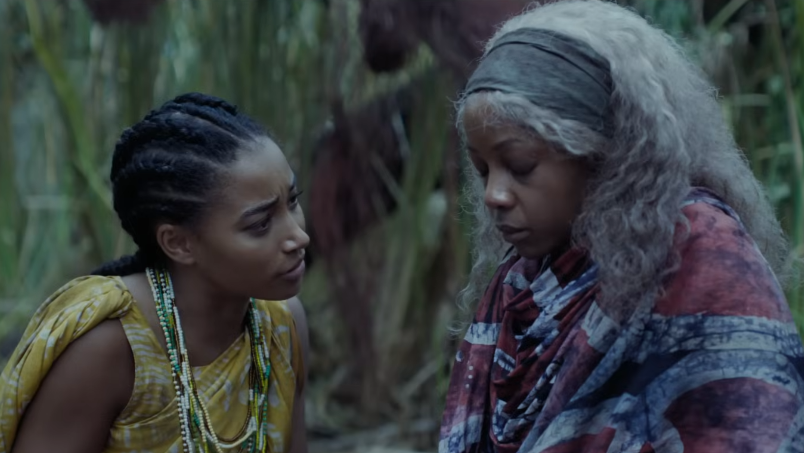 Amandla Stenberg as Princess Amari speaks to Thuso Mbedu as Zélie in a still from ‘Children of Blood and Bone’ (Image Source: YouTube | Paramount Pictures)