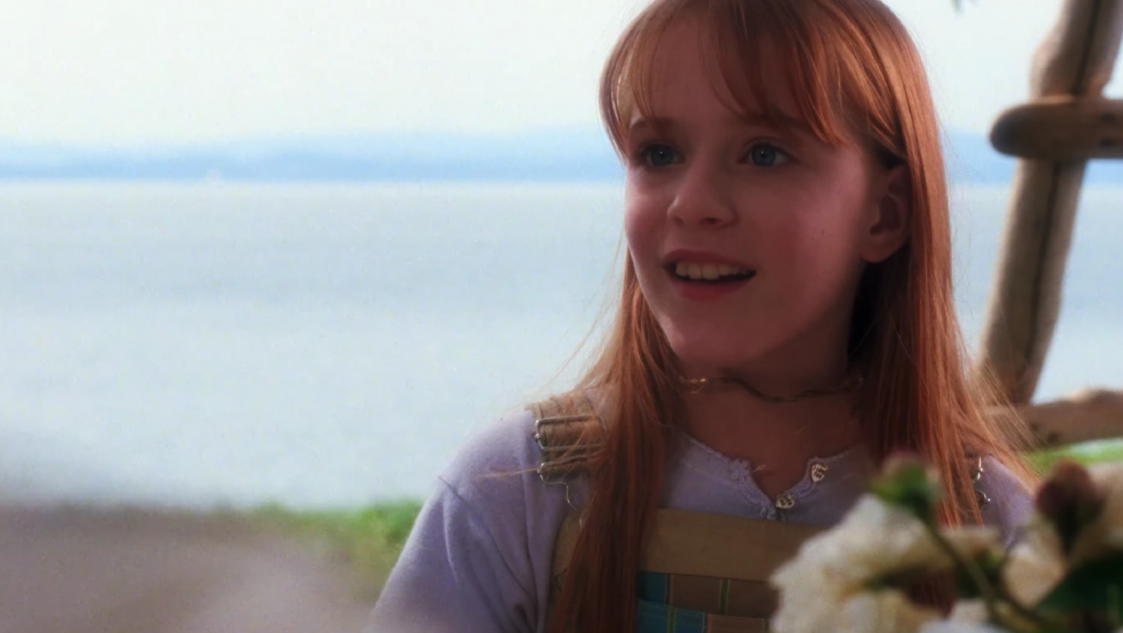 A still of 11-year-old Kylie Owens (Evan Rachel Wood) from 'Practical Magic' 1 (Image Source: YouTube |  @warnerbrosentertainment)