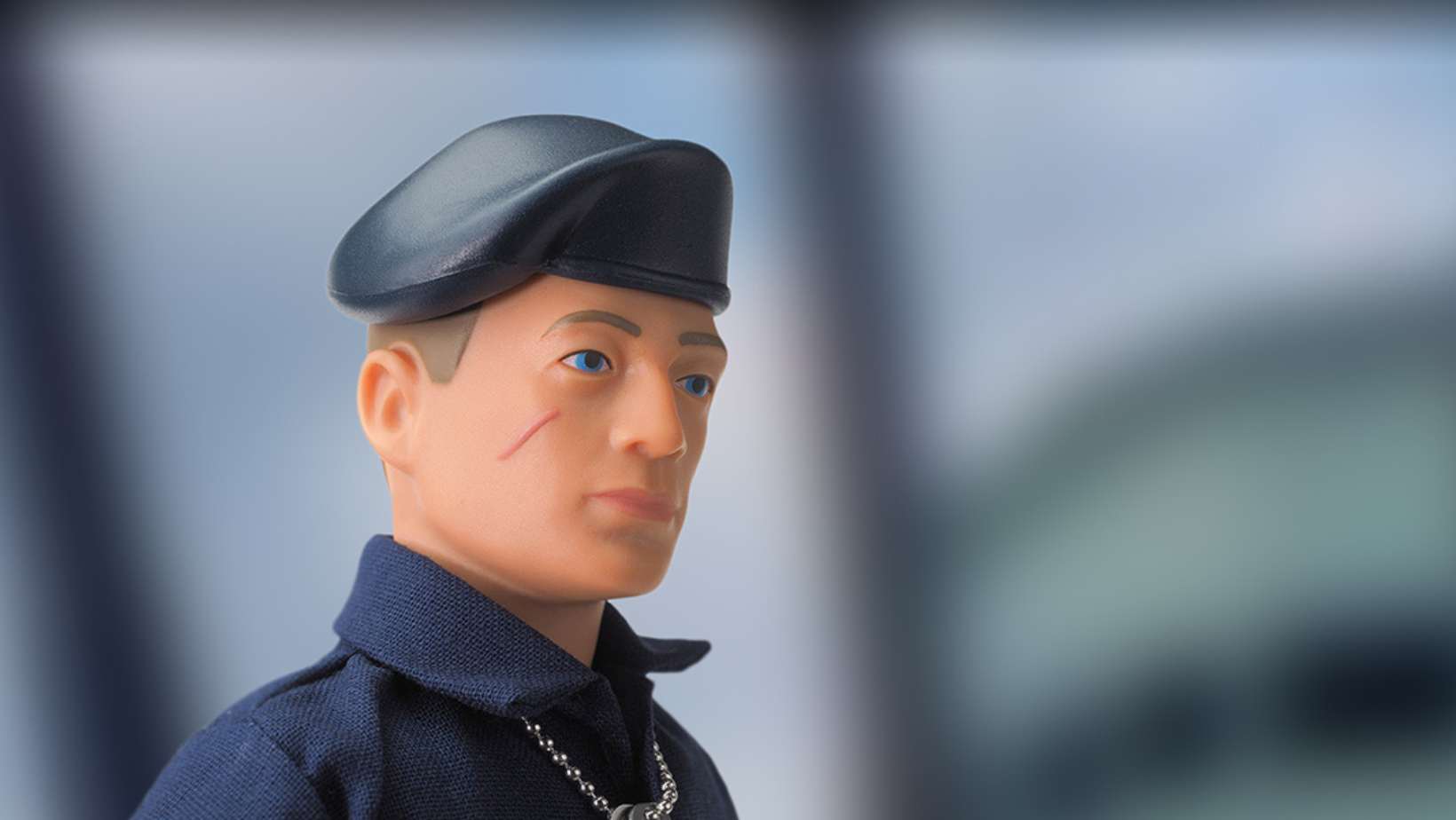 Action Man toy posing for camera