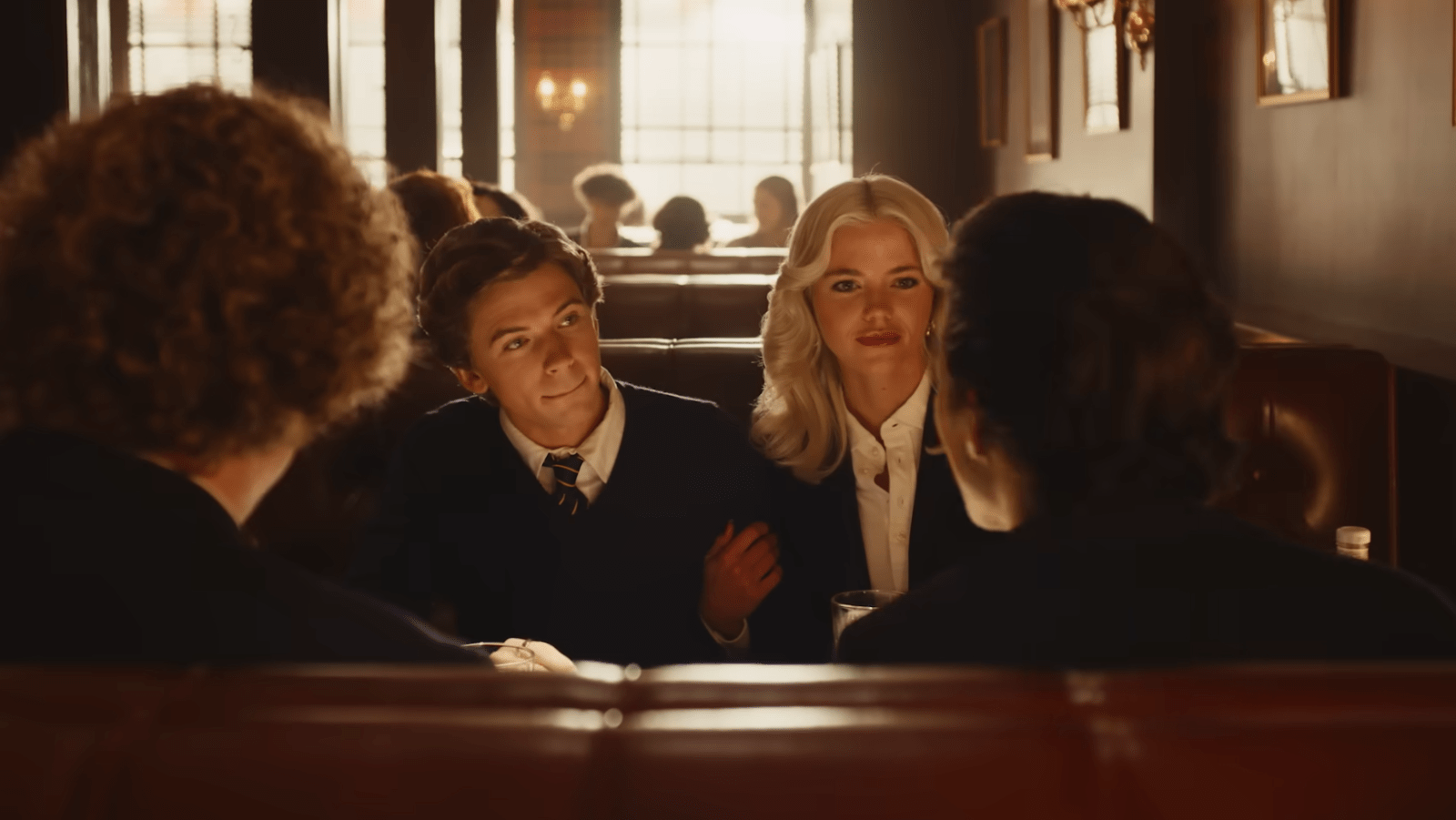 Igby Rigney as Bret and Hayes Warner as Debbie sit with their friends at a diner in ‘The Shards’ (Image Source: YouTube | FX Networks trailer)