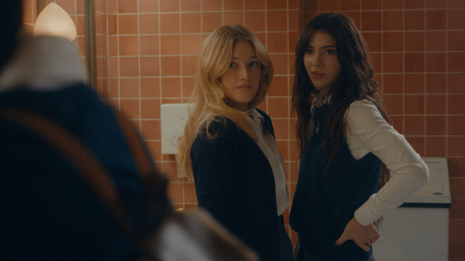 Kristina Bogic as Anya and Sara Boustany as Elise in episode 101 of ‘The Body.’ (Image source: Netflix Tudum)