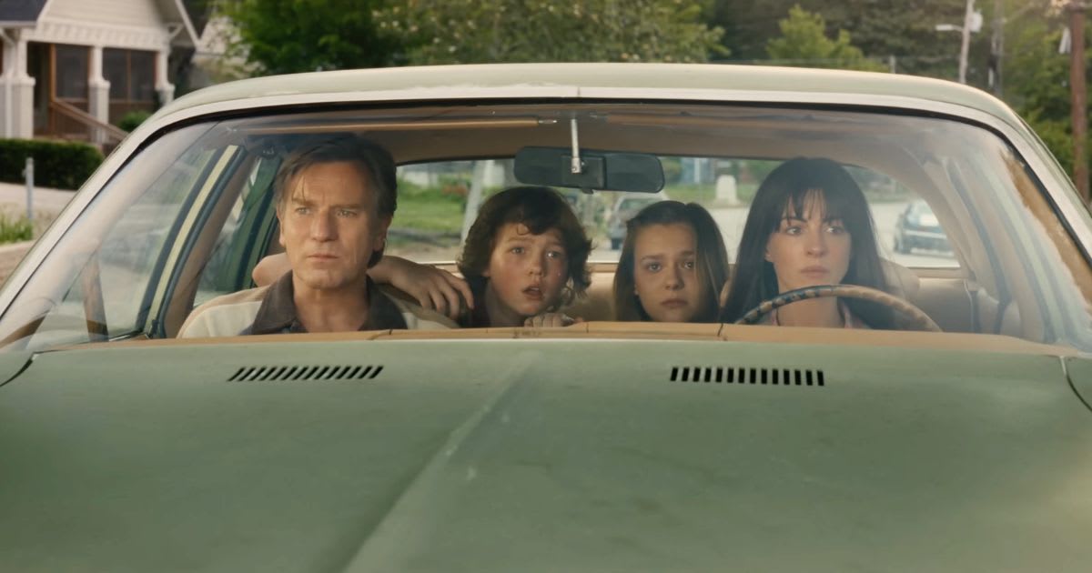 Ewan McGregor, Anne Hathaway, Maisy Stella, and Christian Convery in a still from 'The End of Oak Street'