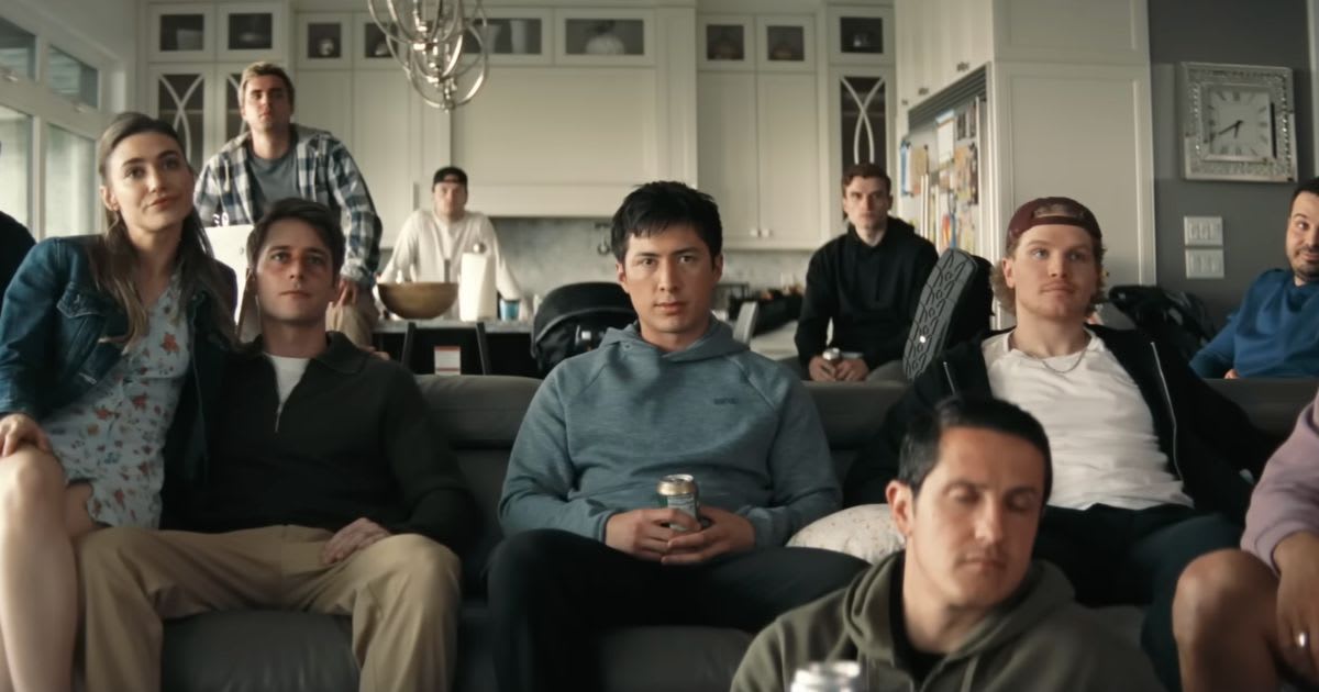 Hudson Williams as Shane Hollander in the middle in a still from 'Heated Rivalry'