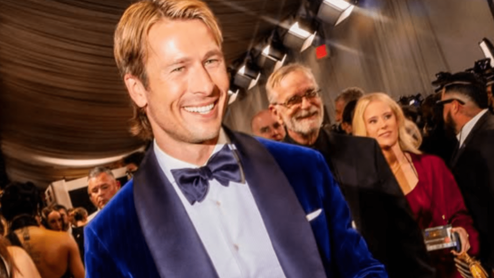 Glen Powell posing for camera