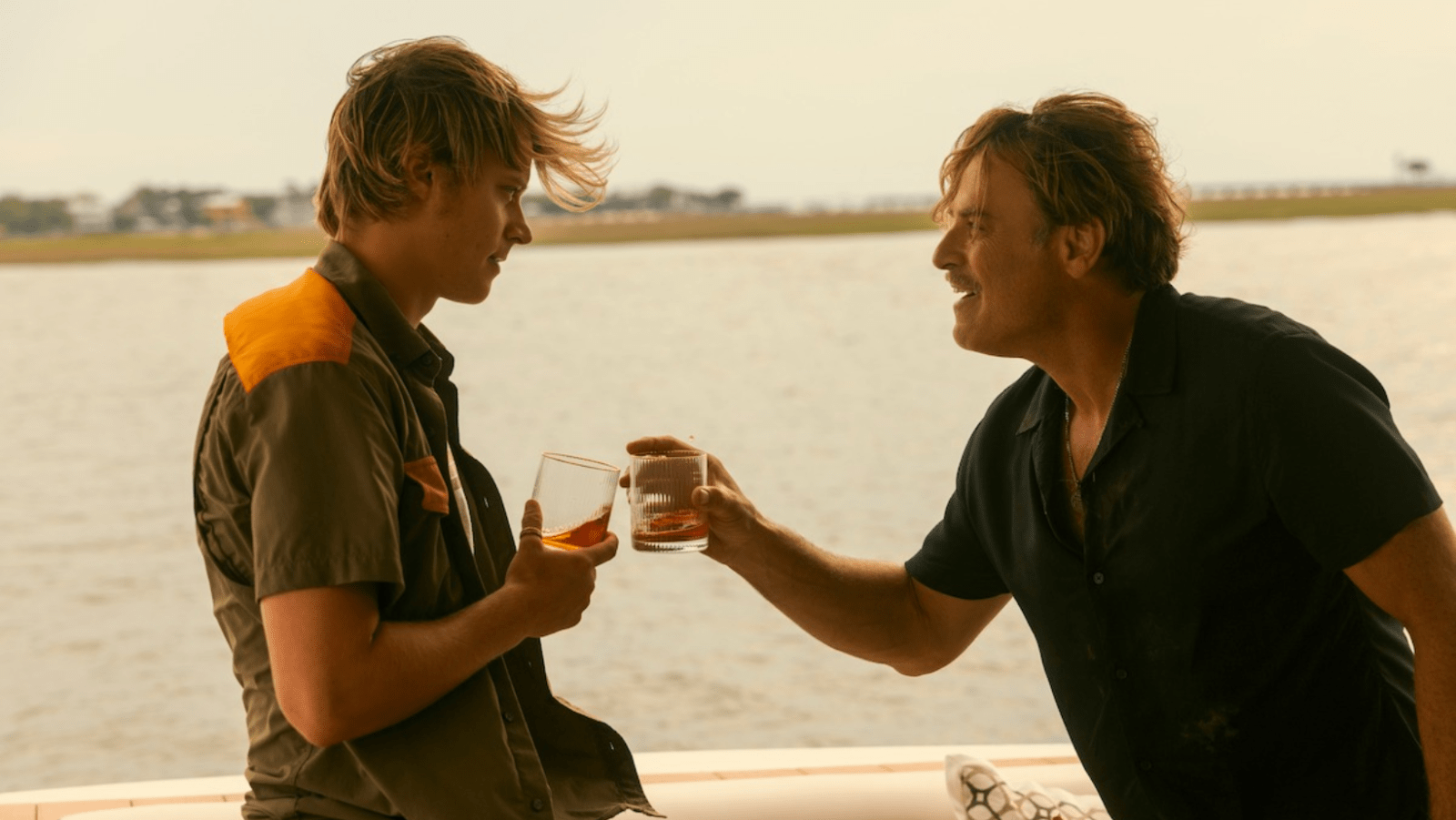 Rudy Pankow as JJ Maybank and Gary Weeks as Luke Maybank in a still from ‘Outer Banks’ (Image Source: Netflix)