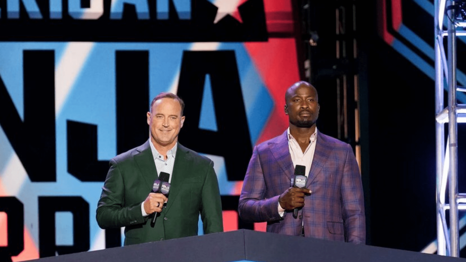 A still of Matt Iseman and Akbar Gbajabiamila from 'ANW' Season 18
