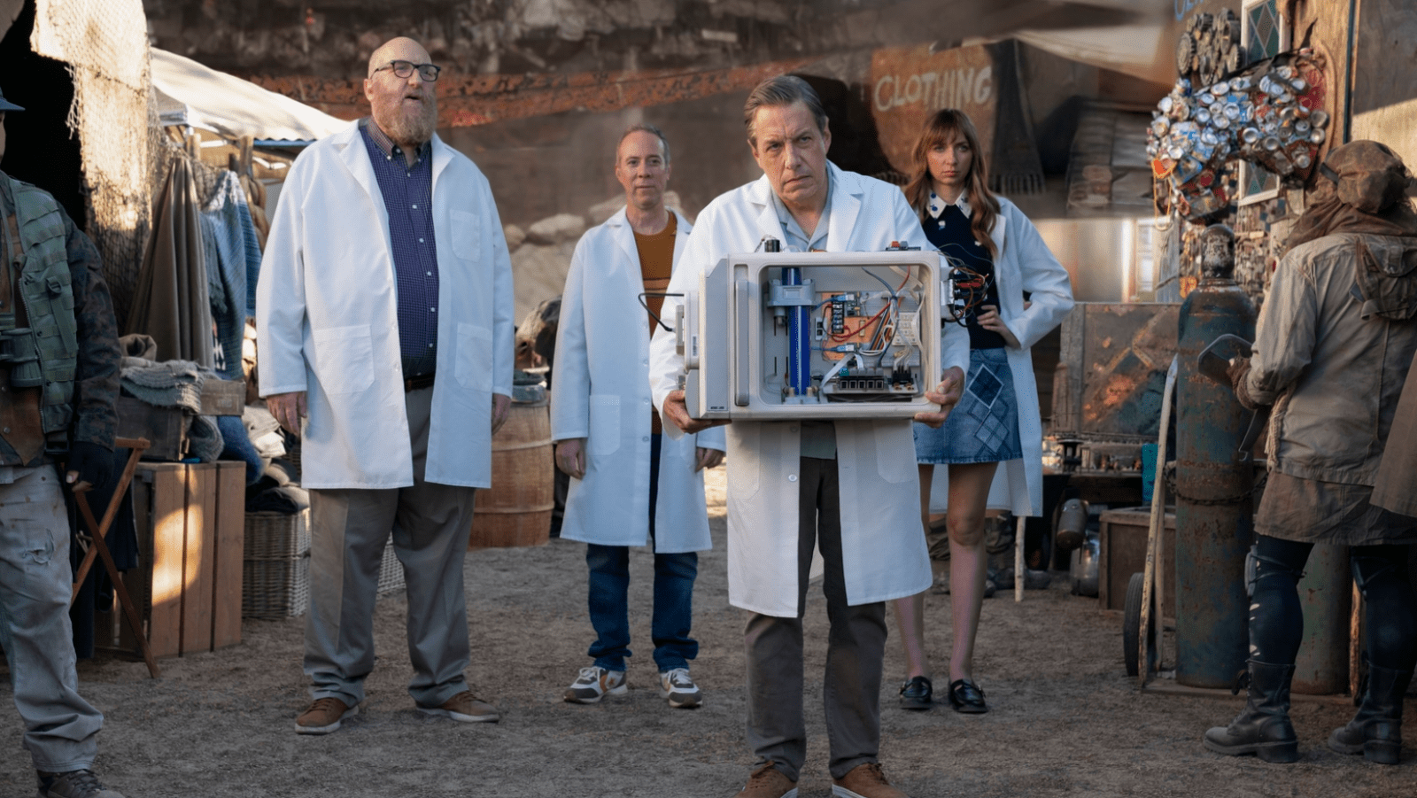 Alternate versions of Bert, Stuart, Kripke and Denise carry the multiverse device in ‘Stuart Fails to Save the Universe’ Episode 7 (Image Source: Colin Remas Brown/HBO Max)