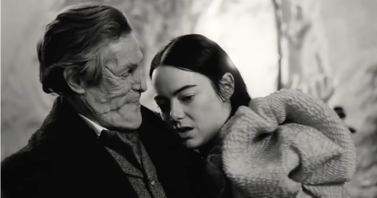 Willem Dafoe as Godwin Baxter and Emma Stone as Bella Baxter in a still from 'Poor Things'