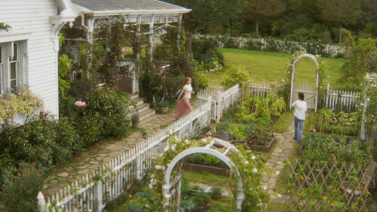 Sandra Bullock (L) and Nicole Kidman as Sally and Gillian Owens in their garden 'Practical Magic 2' (Image Source: Warner Bros. Pictures)