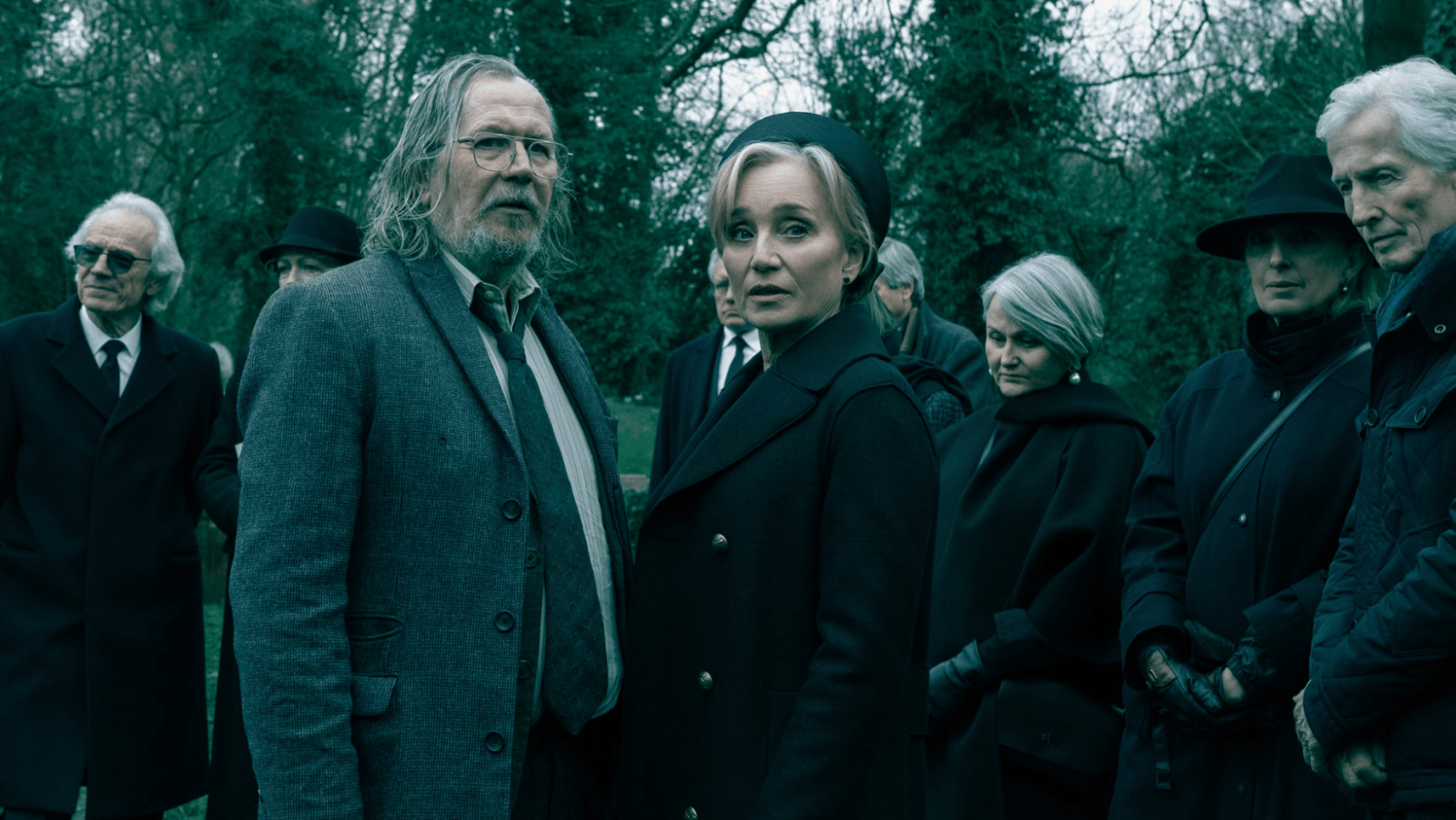 Jackson Lamb (Gary Oldman) and Diana Taverner (Kristin Scott Thomas) at David Cartwright's funeral in 'Slow Horses' season 6 (Image Source: Apple TV)