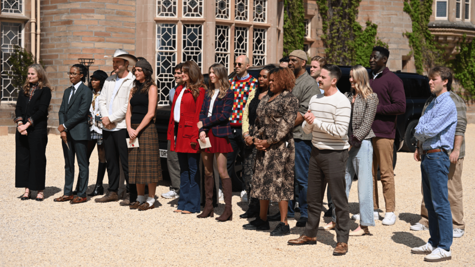 Contestants gather outside the castle in 'The Traitors: New Blood' (Image Source: NBC | Euan Cherry)
