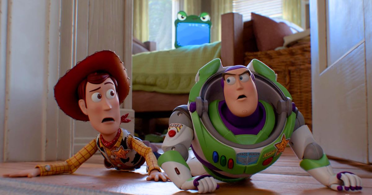Tom Hanks, Tim Allen, and Greta Lee in a still from 'Toy Story 5'