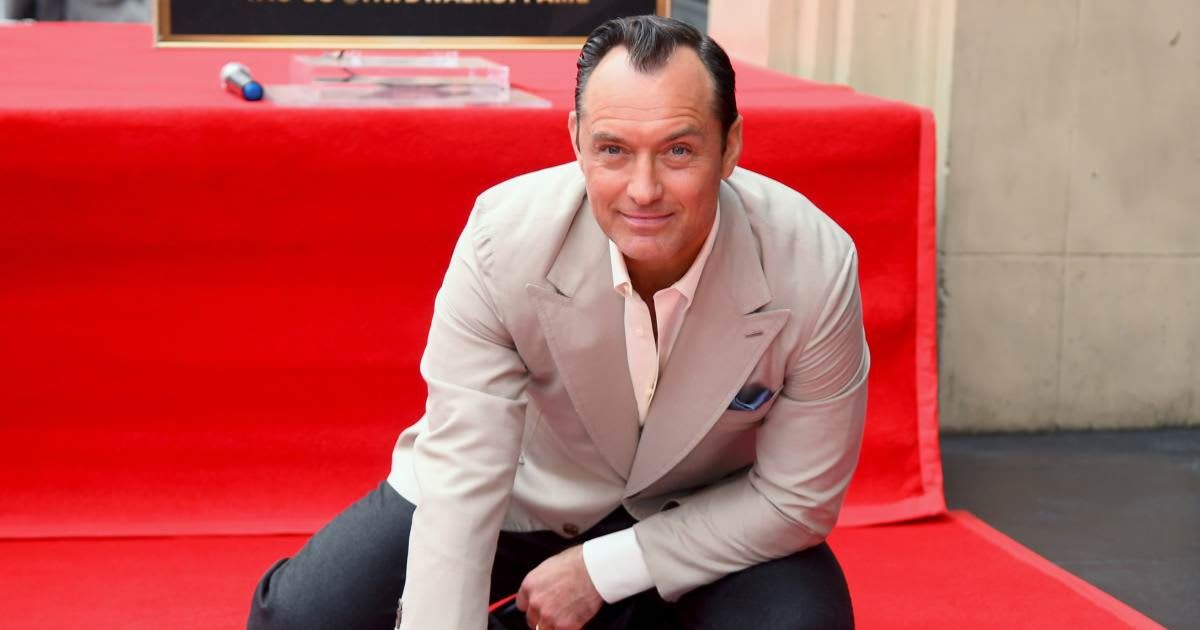 HOLLYWOOD, CALIFORNIA - DECEMBER 12: Jude Law poses with his star during the Jude Law Star Ceremony on Hollywood Boulevard in Hollywood, California on December 12, 2024