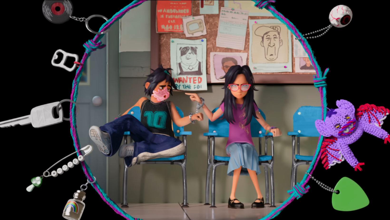 A memory of Jo and Raissa in a classroom appears inside a friendship bracelet in a still from the ‘Forgotten Island’ trailer (Image Source: DreamWorks Animation/Universal Pictures)