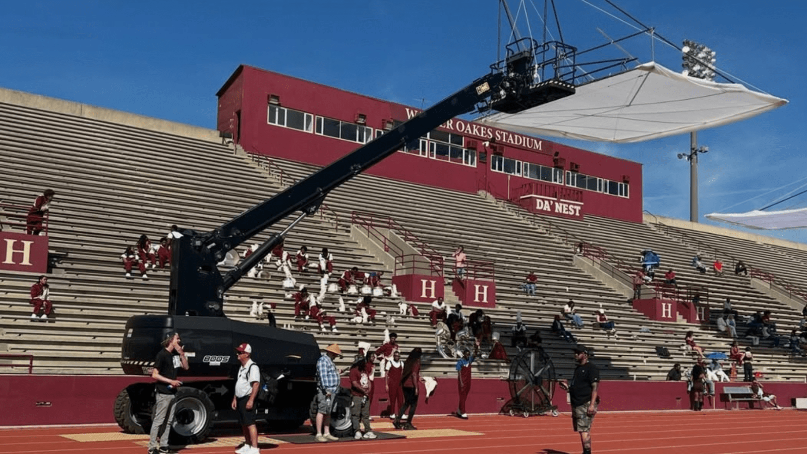 Filming equipment and performers at Morehouse College’s B.T. Harvey Stadium, dressed as Hillman’s Walter Oakes Stadium for ‘A Different World’ (Image Source: Instagram | @acelestialspirit)