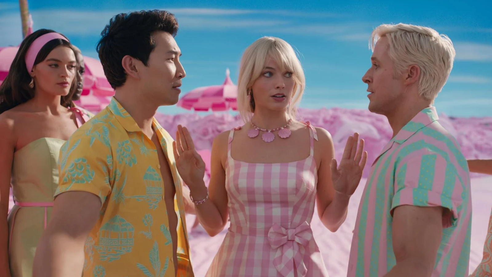 Simu Liu (L), Margot Robbie (C) and Ryan Gosling (R) in a scene from 'Barbie' (Image Source: Warner Bros. Pictures)