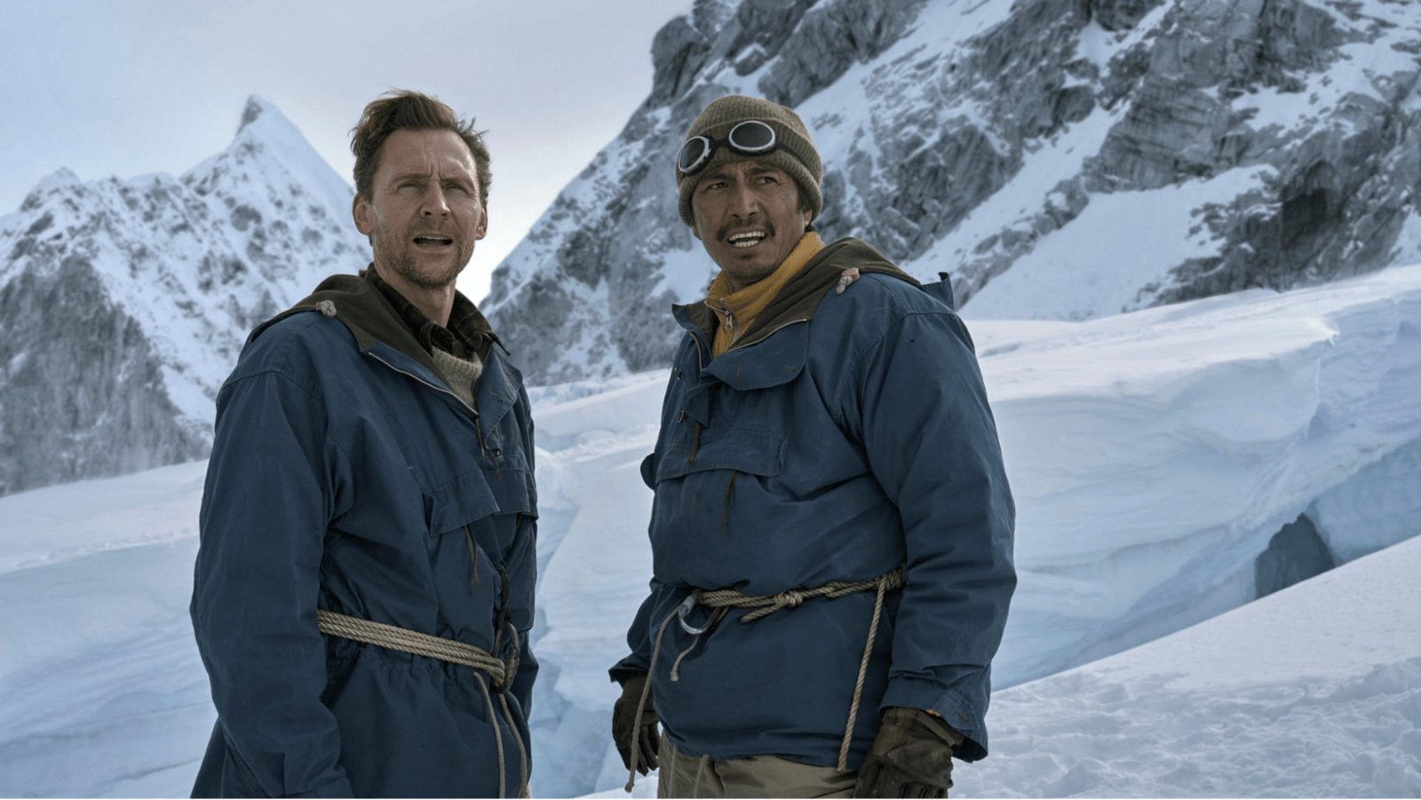 Tom Hiddleston (L) and Genden Phuntsok (R) film 'Tenzing's' mountain sequences in New Zealand (Image Source: Apple TV)