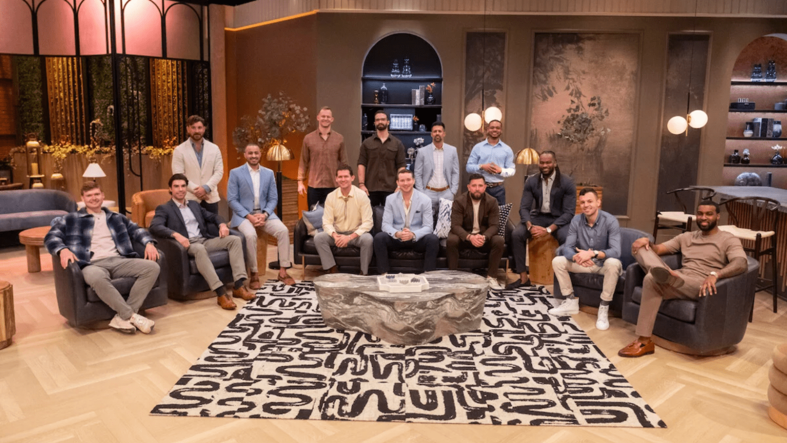 The men of ‘Love Is Blind’ Season 11 pose in the lounge ahead of their pod dates (Image Source: Netflix)