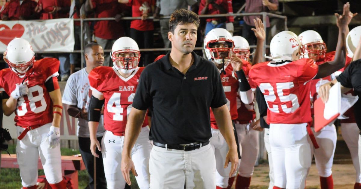 Kyle Chandler and Omaka Omegah in a still from 'Friday Night Lights'